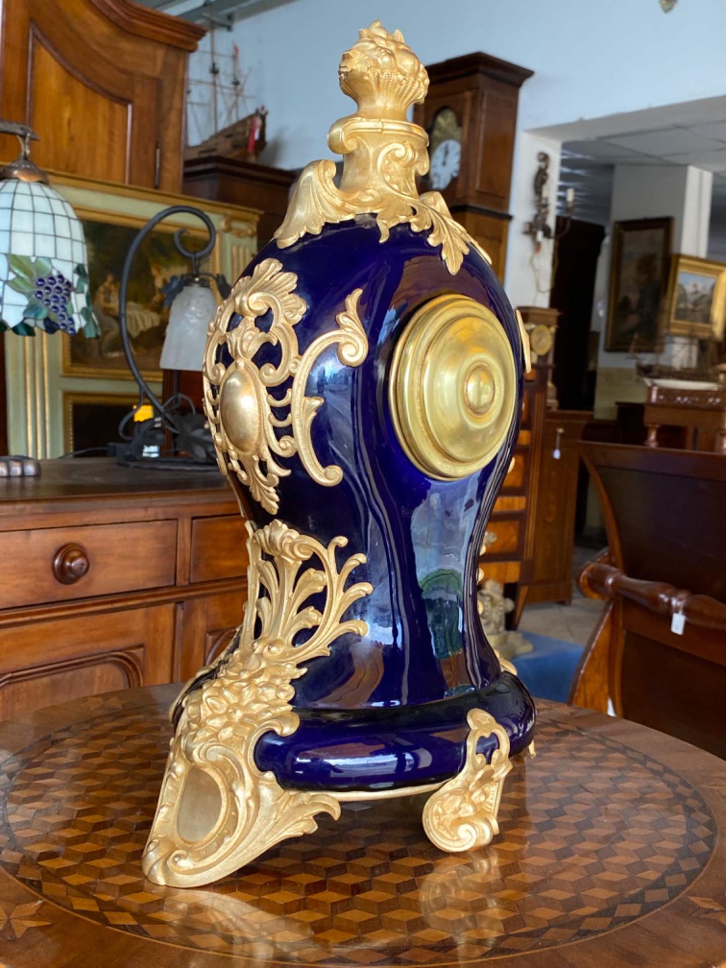Orologio Da Camino In Legno Finitura Rovere Con Pendolo – Quadrante Romano – 22x16x11 Cm